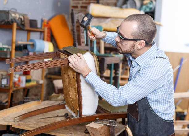 Furniture craftsman at work in workshop